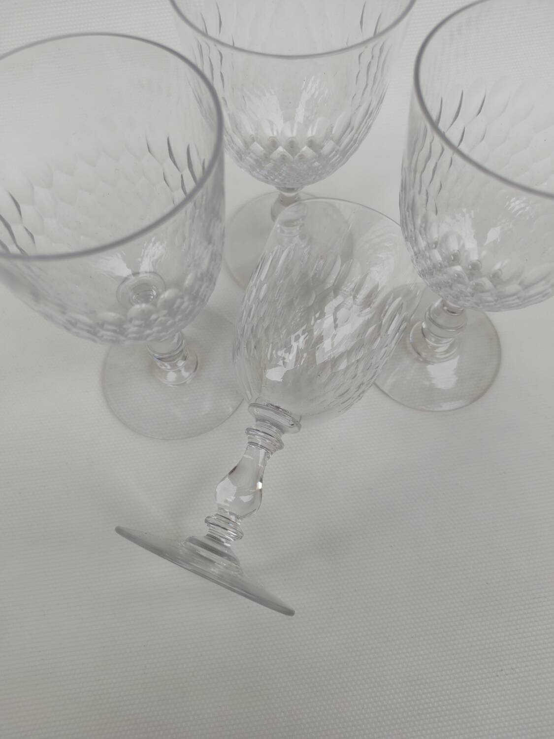 4 large crystal glasses by Baccarat, model Scales, from around 1920.