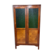 Vintage wooden display cabinet with green glass.