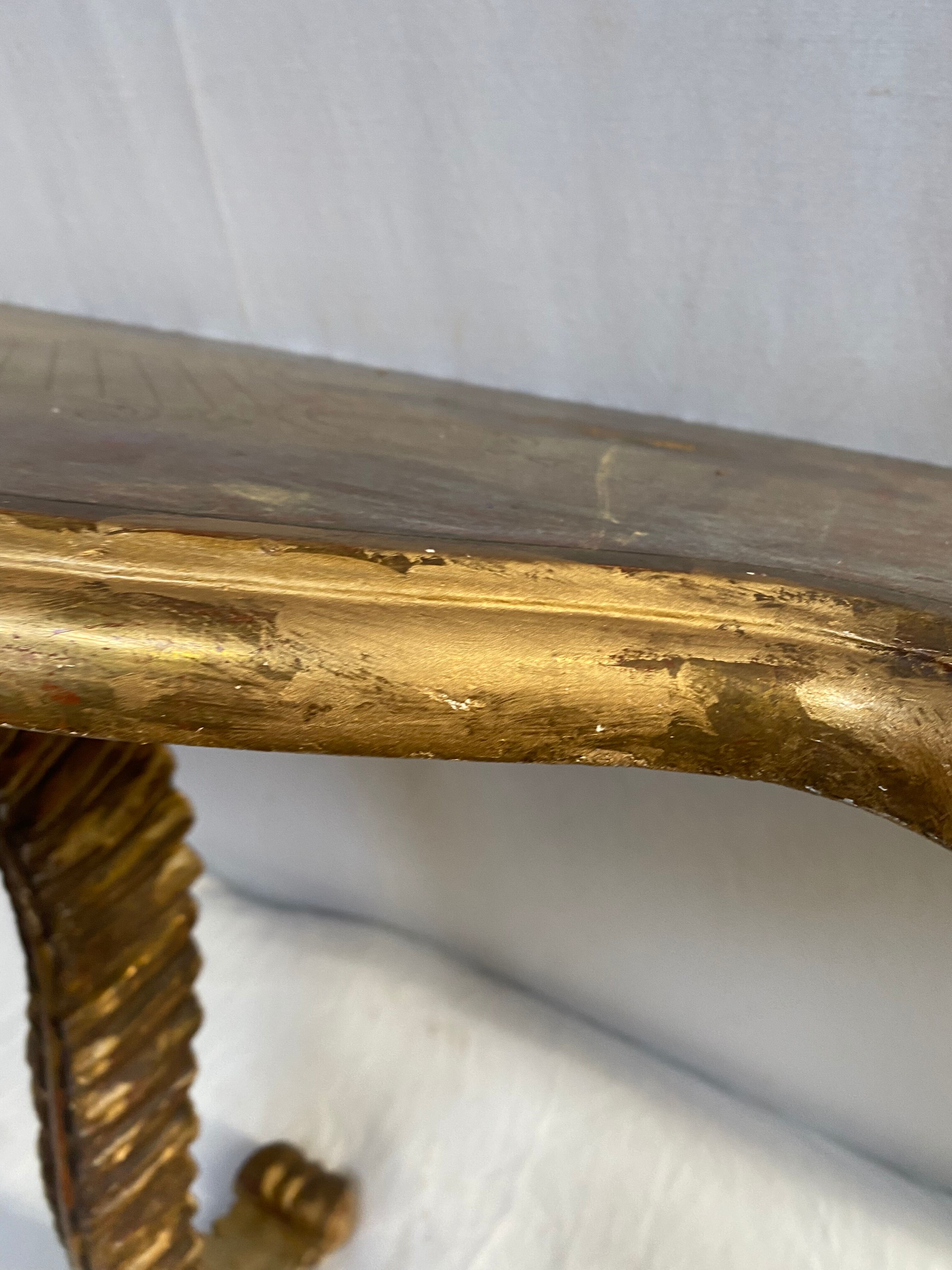 Wooden wall console and antique gilded stucco