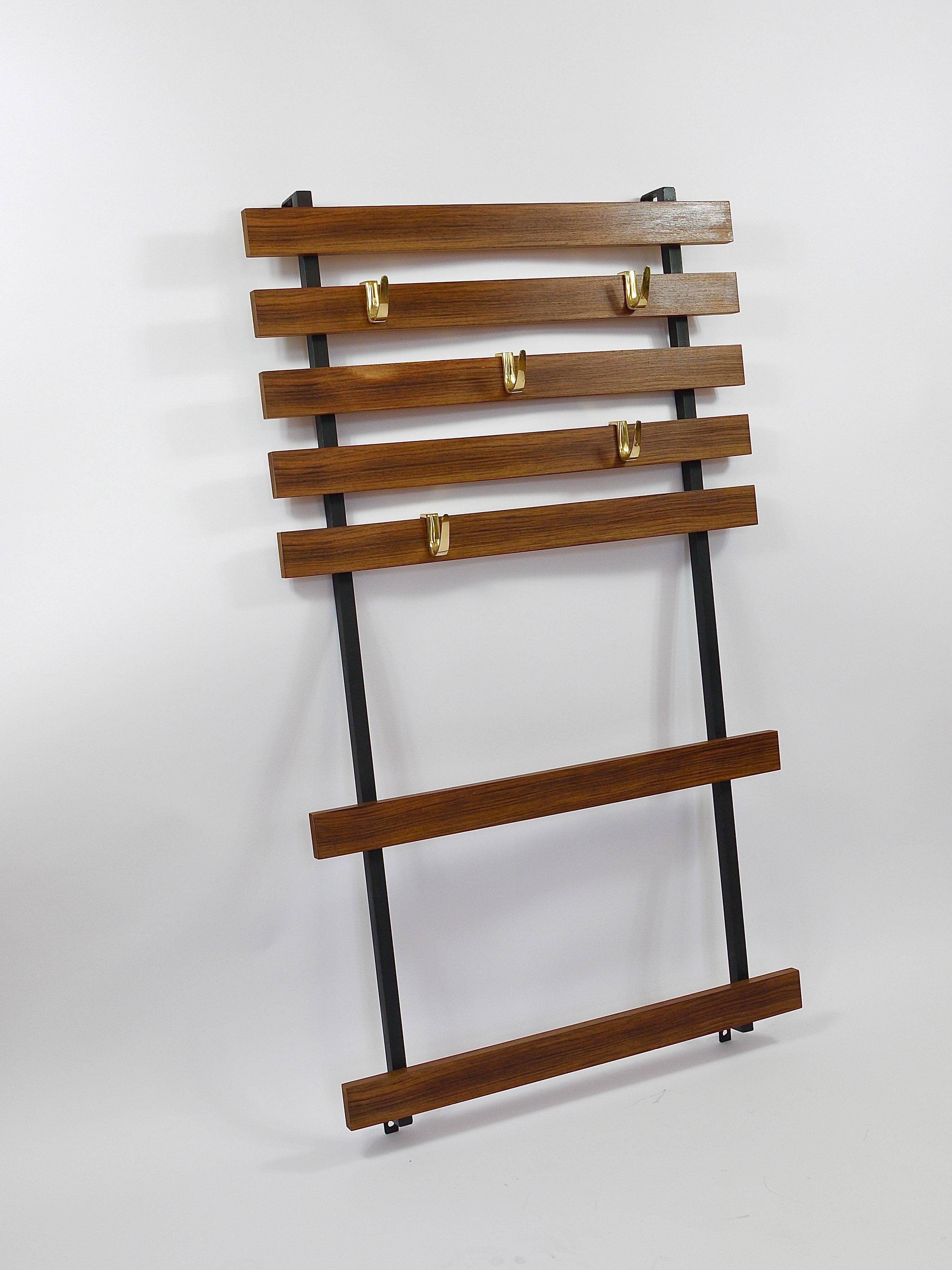 Wall coat rack by Carl Aubock with 5 brass hooks, walnut, iron, Austria, 1950s.