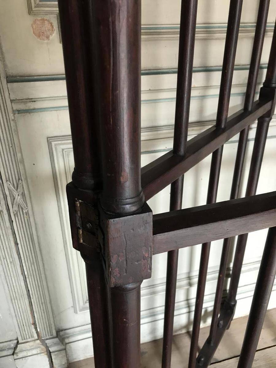 Wooden screen, partition, or grille made of turned wood