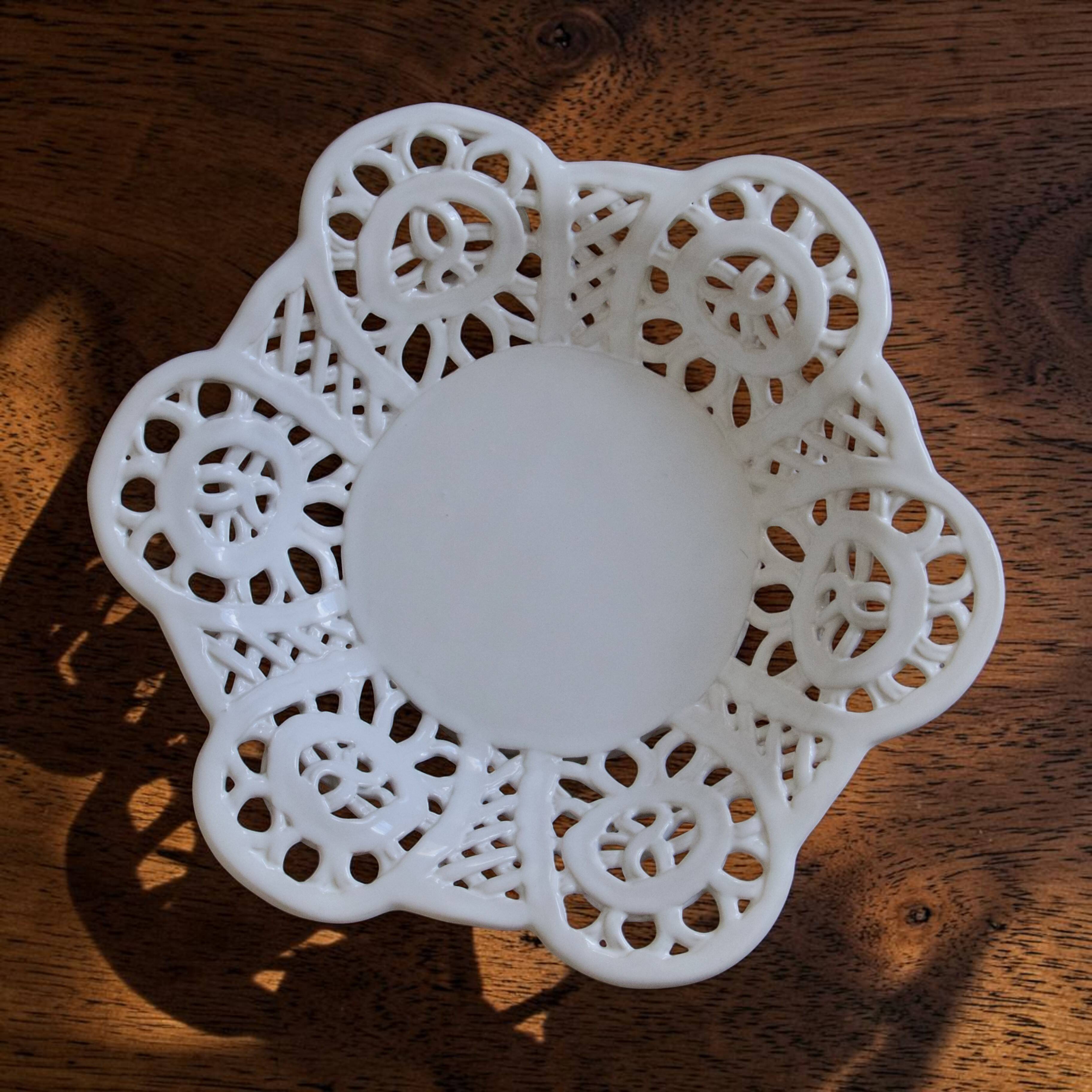 Vintage cup in openwork porcelain lace