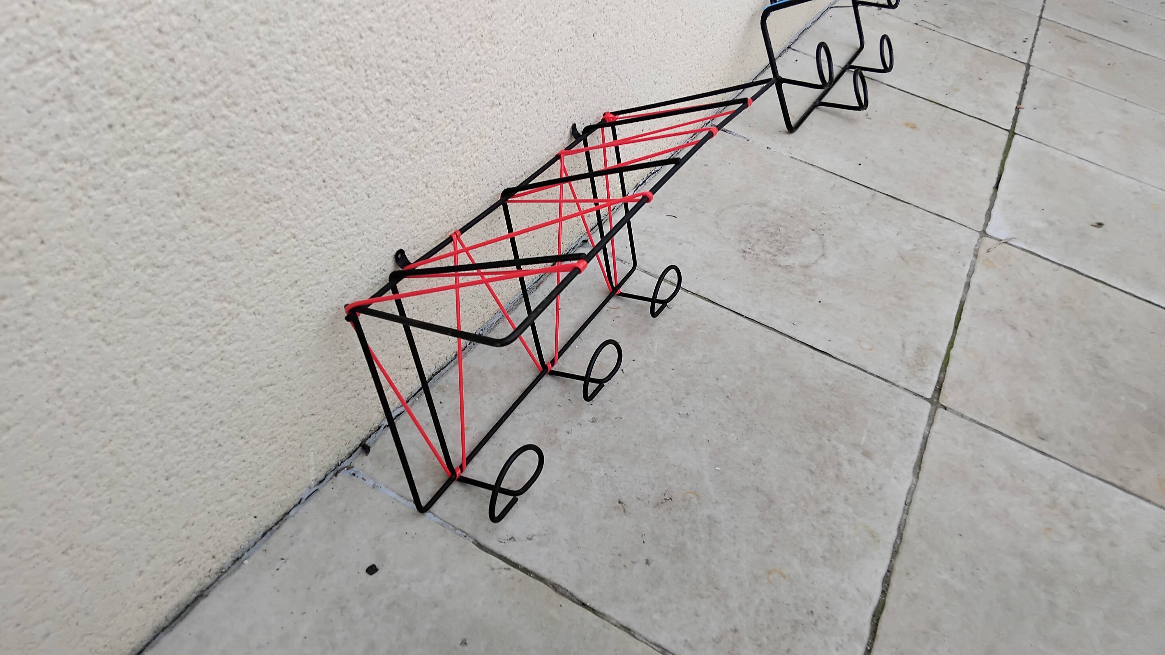 Vintage metal coat rack and wall-mounted scoubidou