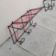 Vintage metal coat rack and wall-mounted scoubidou