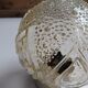 Round relief luminaire glass RZB and its electrifiable support.
