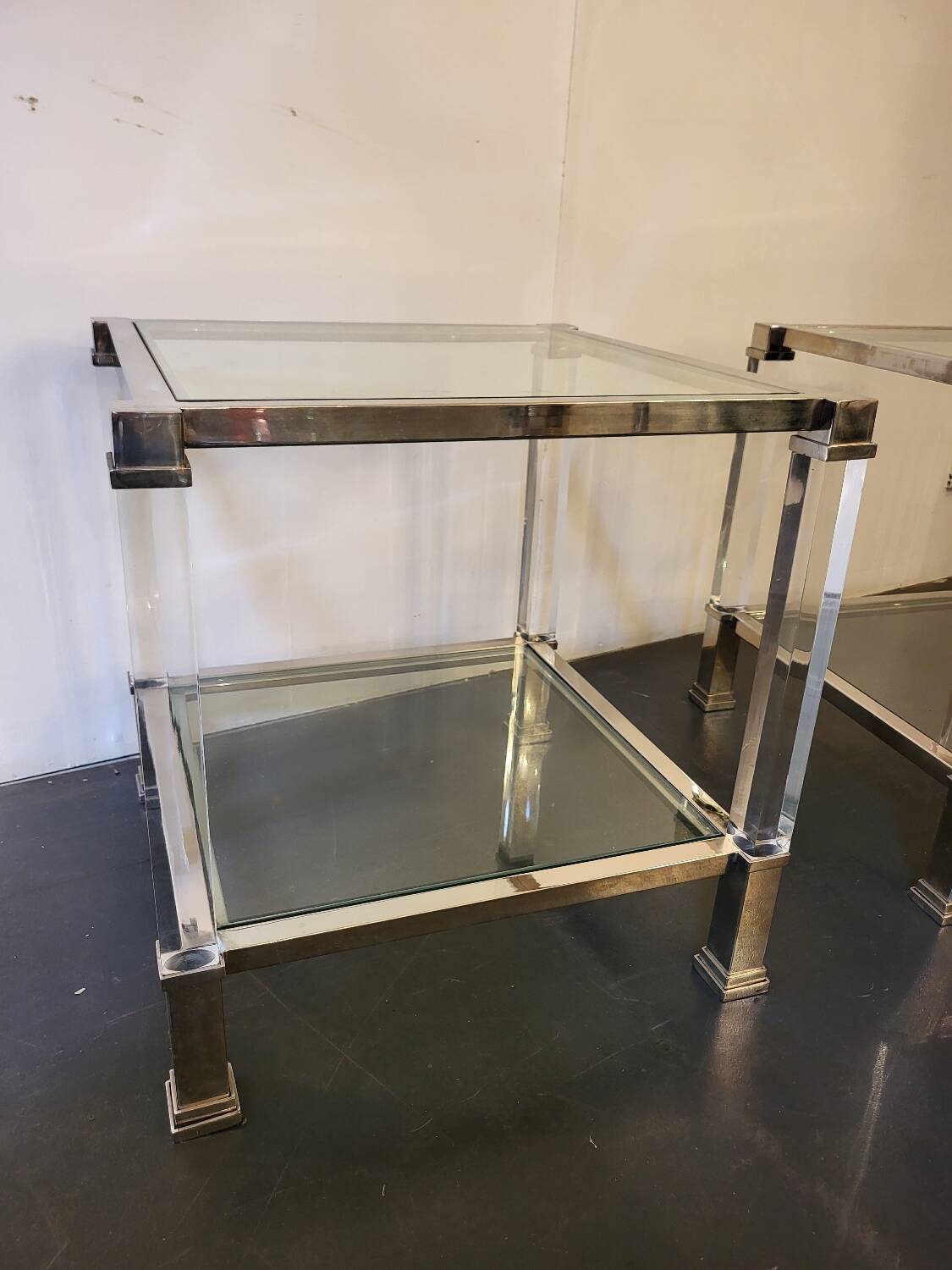 Paire de bouts de canapé en laiton chromé