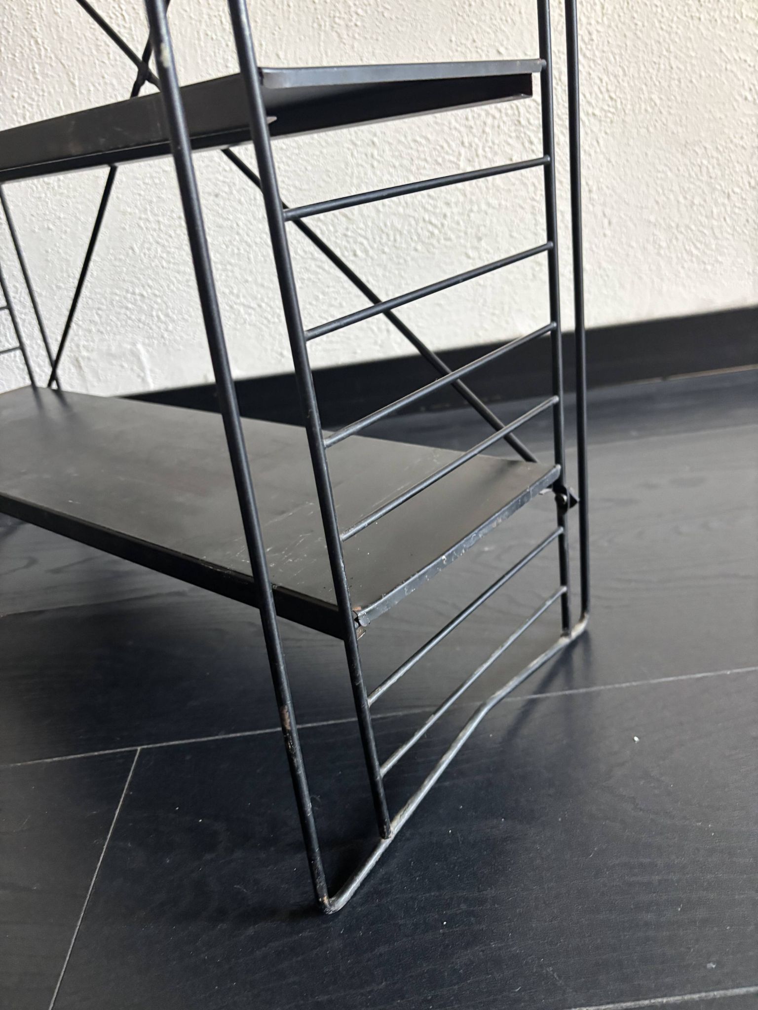Vintage 1950 shelf taken on design legs by A. Dekker, black - 84 x 25 cm