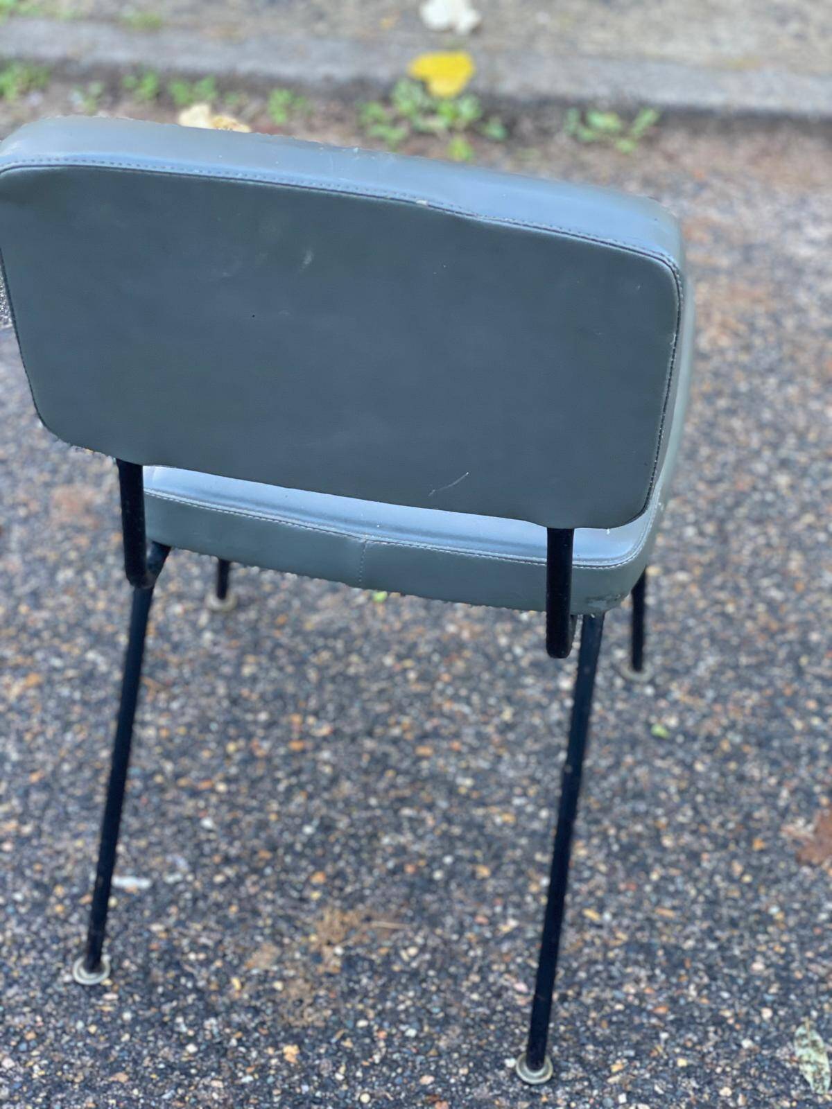 Vintage steel and dark green leather chair from the 60s