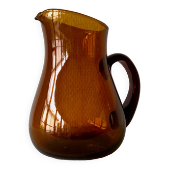Amber colored glass pitcher