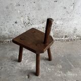 Dark brown solid oak brutalist stool with sculptural backrest, handcrafted mid-century rustic primitive