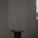 Sculptural African stool in hardwood, curved seat and architectural base, 1970s.