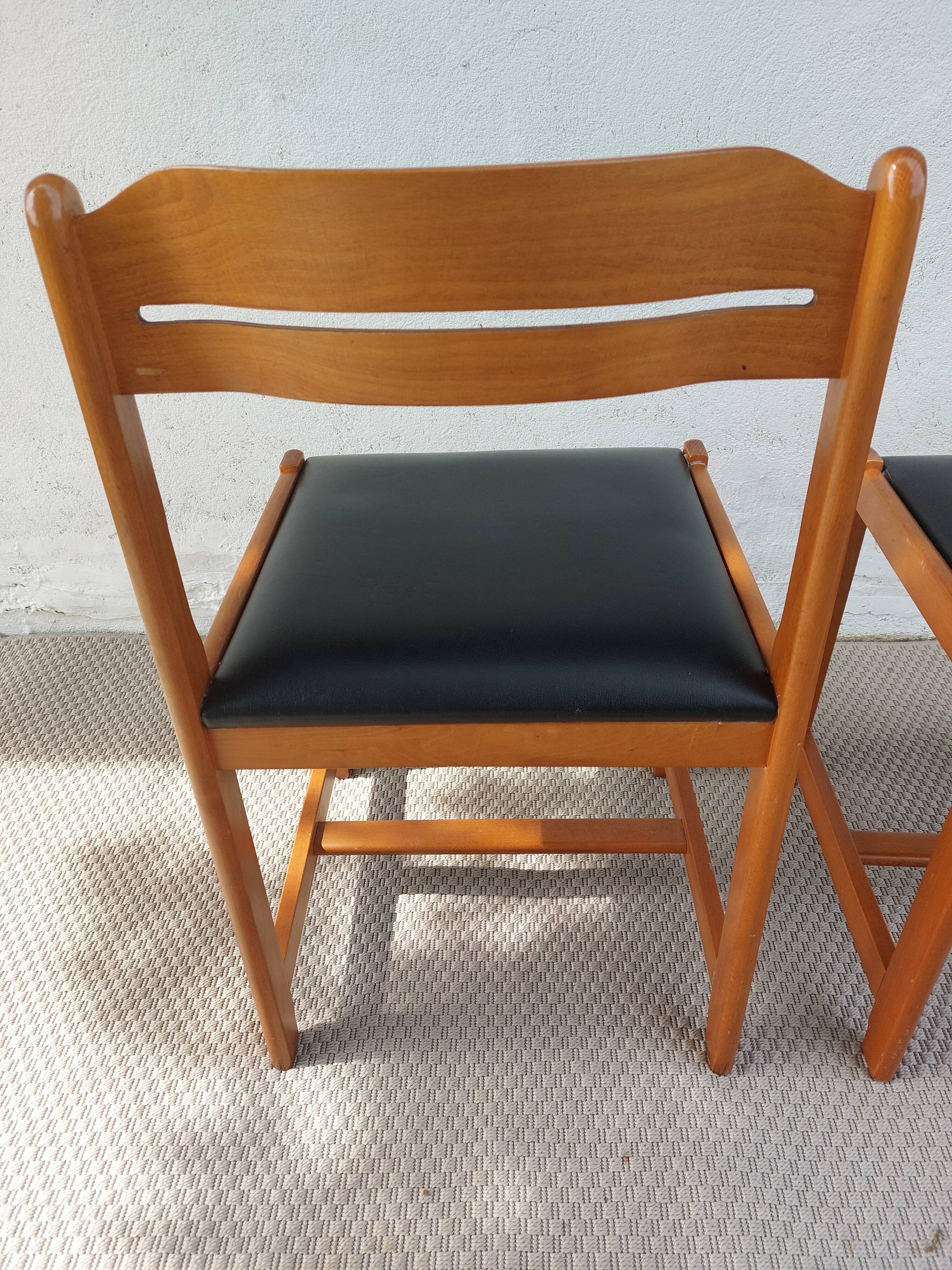 paire de chaises style scandinave, simili cuir noir