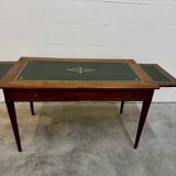 Louis XVI desk with green leather and shelves.