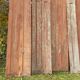 Volets anciens persiennes en parties hautes panneaux pliants bois massif