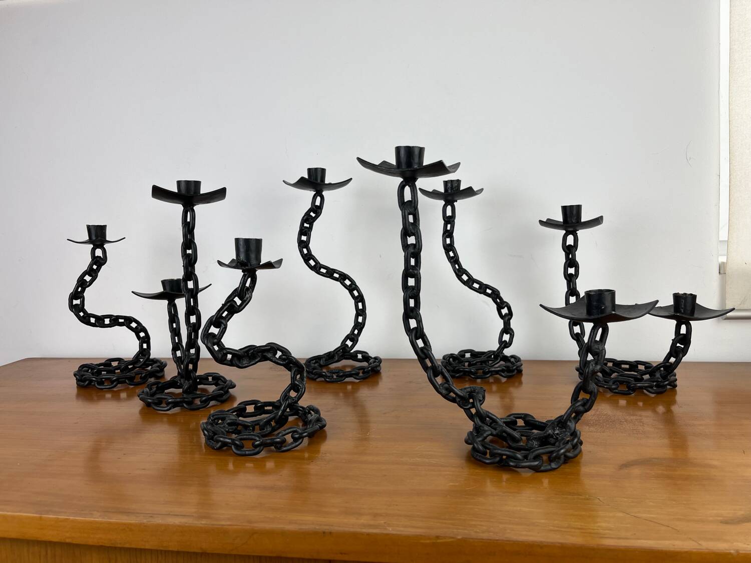 7 wrought iron candle holders in brutalist chain style