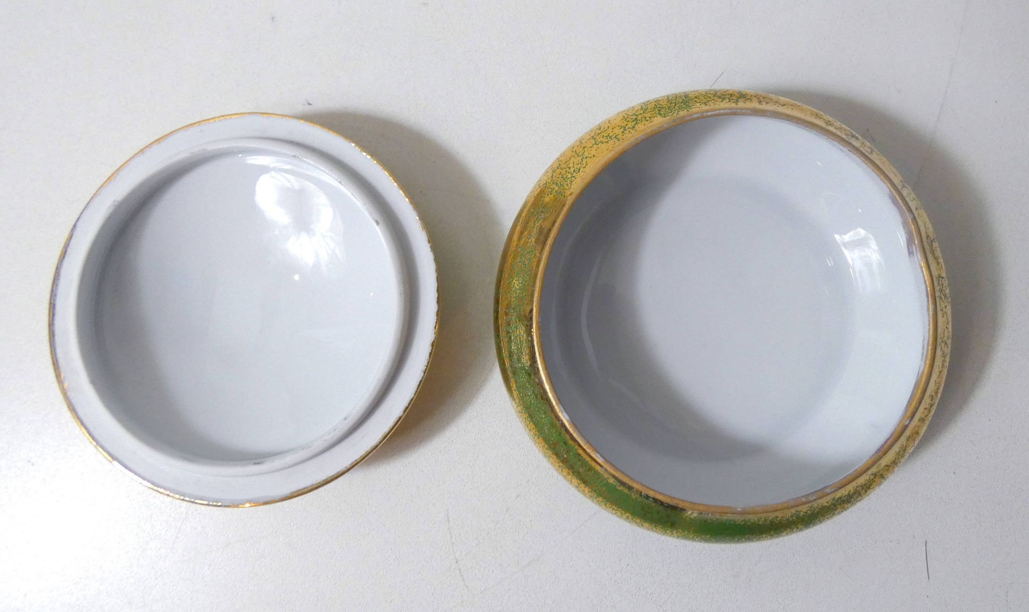Green and gold Limoges porcelain candy box signed Catherine Lainé