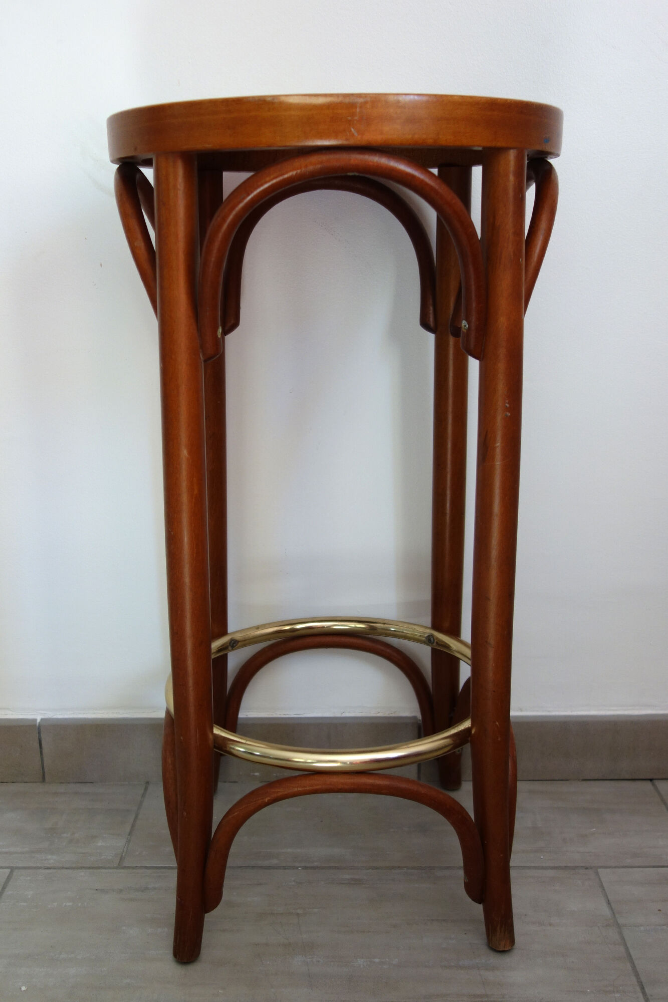 Former curved wooden bistro stool