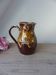 Vintage brown ceramic water jug, rustic pitcher from a 1970s country house.