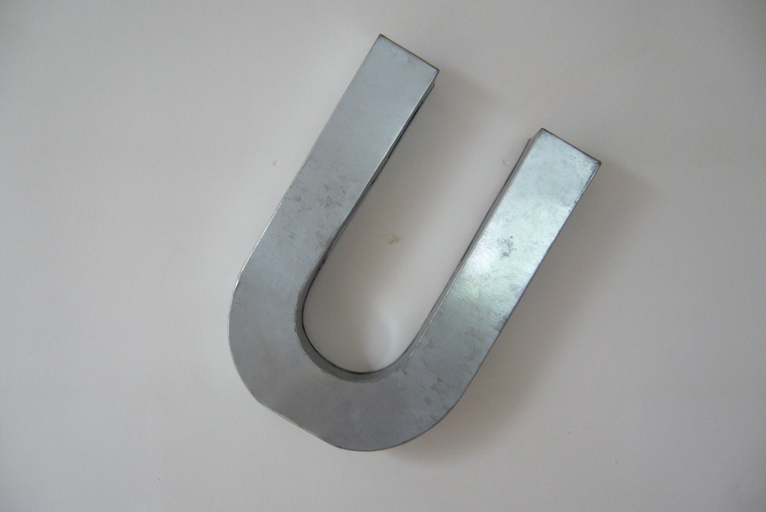 Letter U industrial white metal