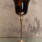 Tinted glass photophore on high metal foot with silver patina