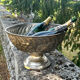 Large silver plated champagne cooler bowl on pedestal with grape