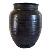 Vase en grès émaillé à couverte sombre. Monogramme JP Jacques Pouchain.