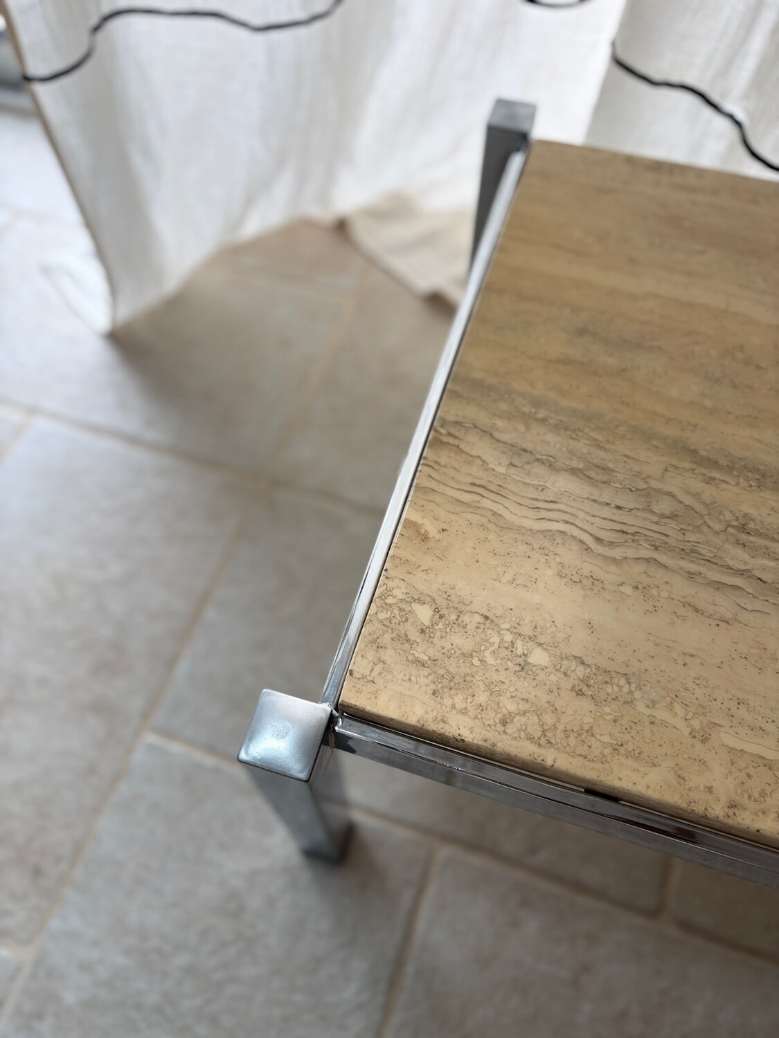 Chrome metal and travertine coffee table, 1970.