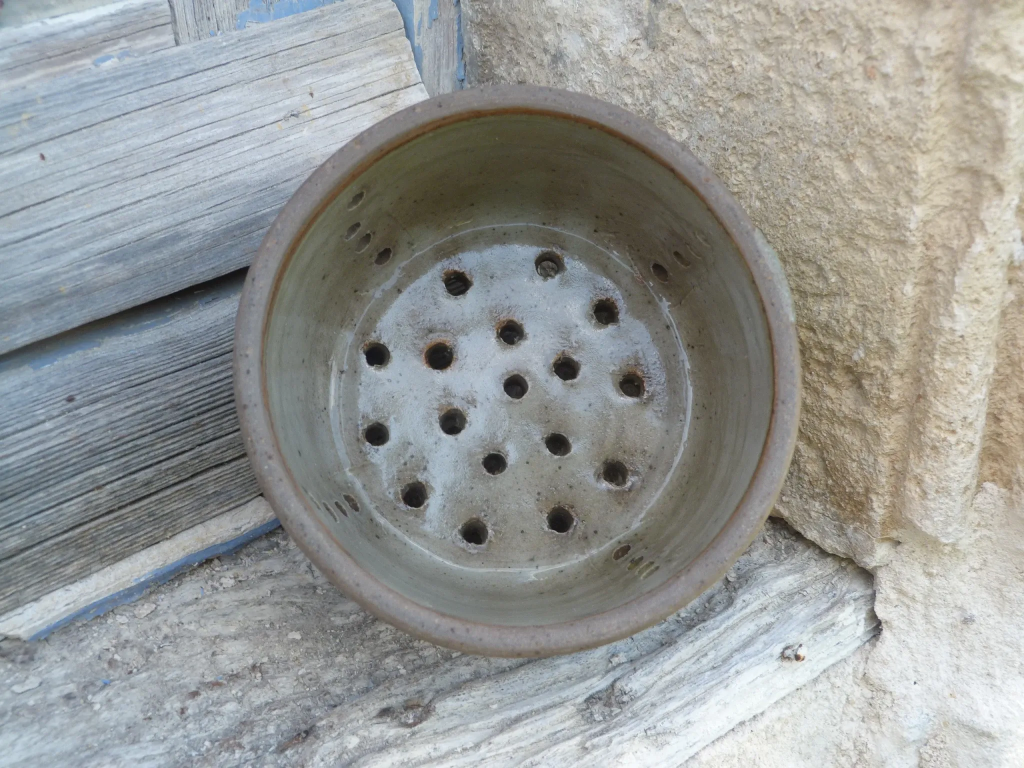 Old stoneware cheese drainer
