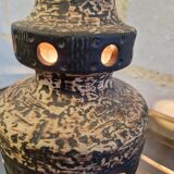 Ceramic lamp with openwork design and double lighting