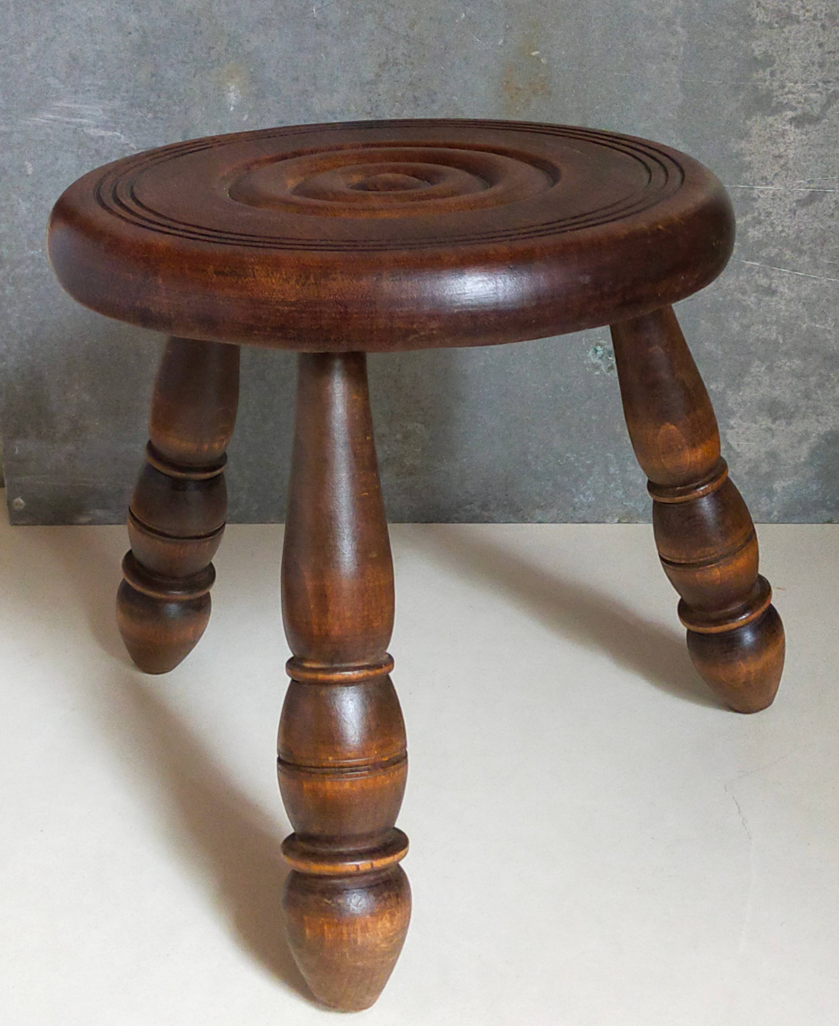Low tripod stool in vintage turned solid wood