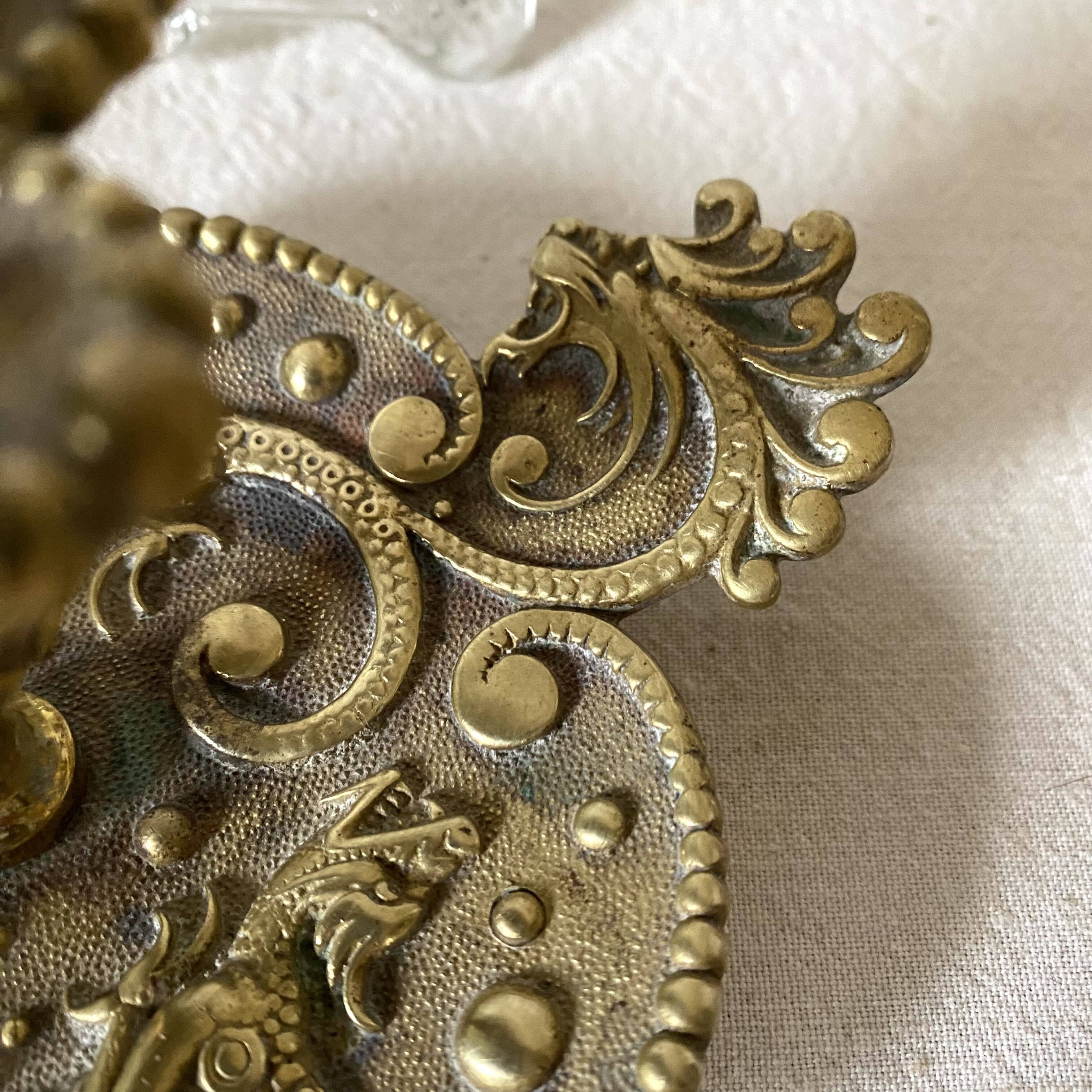 Brass thumb candle holder, scarab