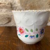 Porcelain cup with chiseled and gilded rim