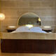 Bed with integrated bedside in rosewood and parchment, art deco period, twentieth century