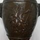 Patinated bronze lamp base medal