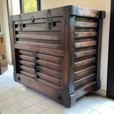 Japanese antique wooden chest with black fittings.