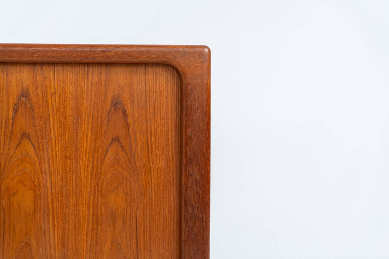 Svend Dyrlund teak sideboard with tambour doors (Denmark, 1960s).