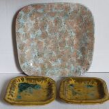 Set of three potter's plates in enamelled earth