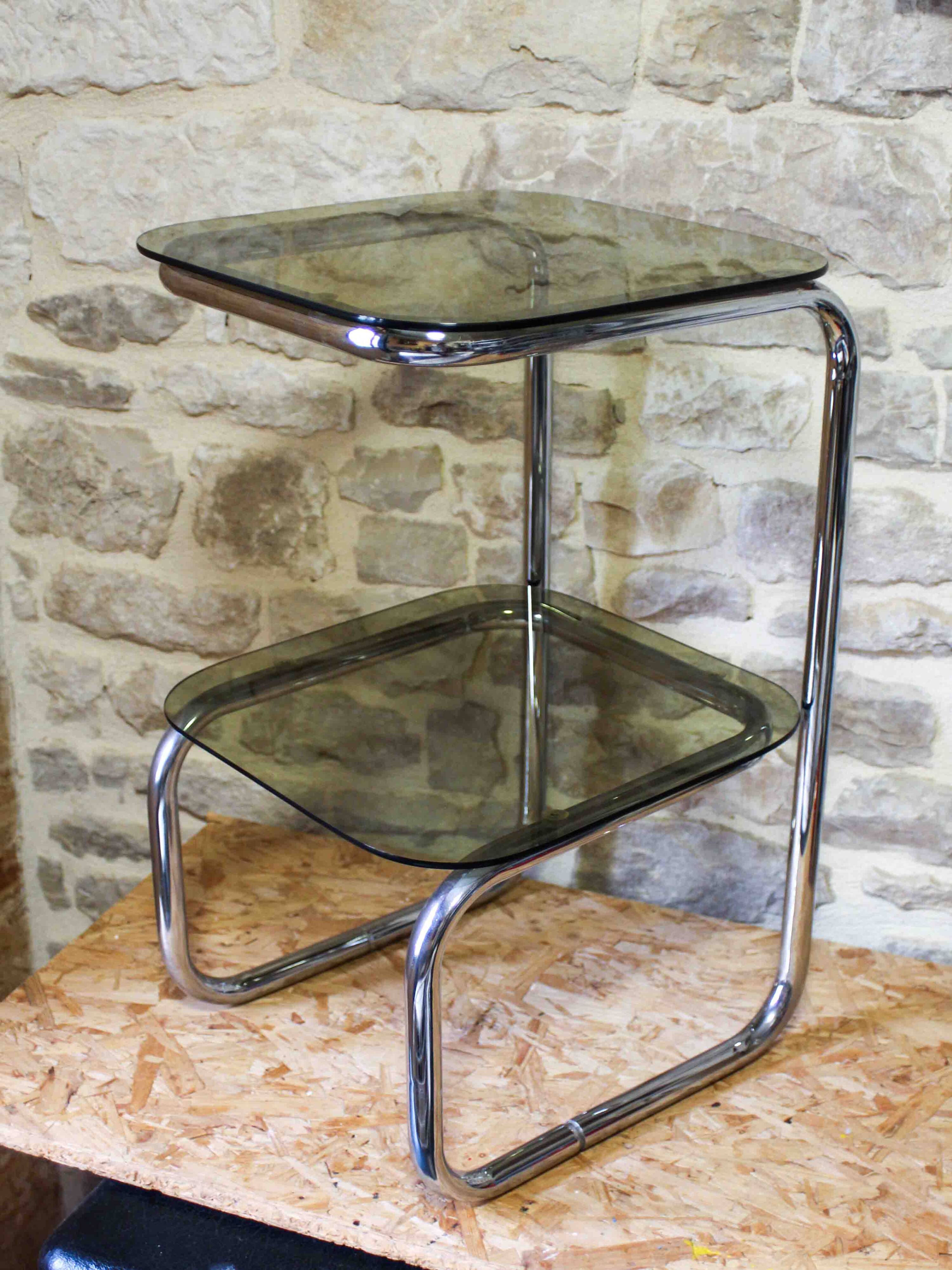 Chrome metal and smoked glass side table.