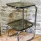Chrome metal and smoked glass side table.