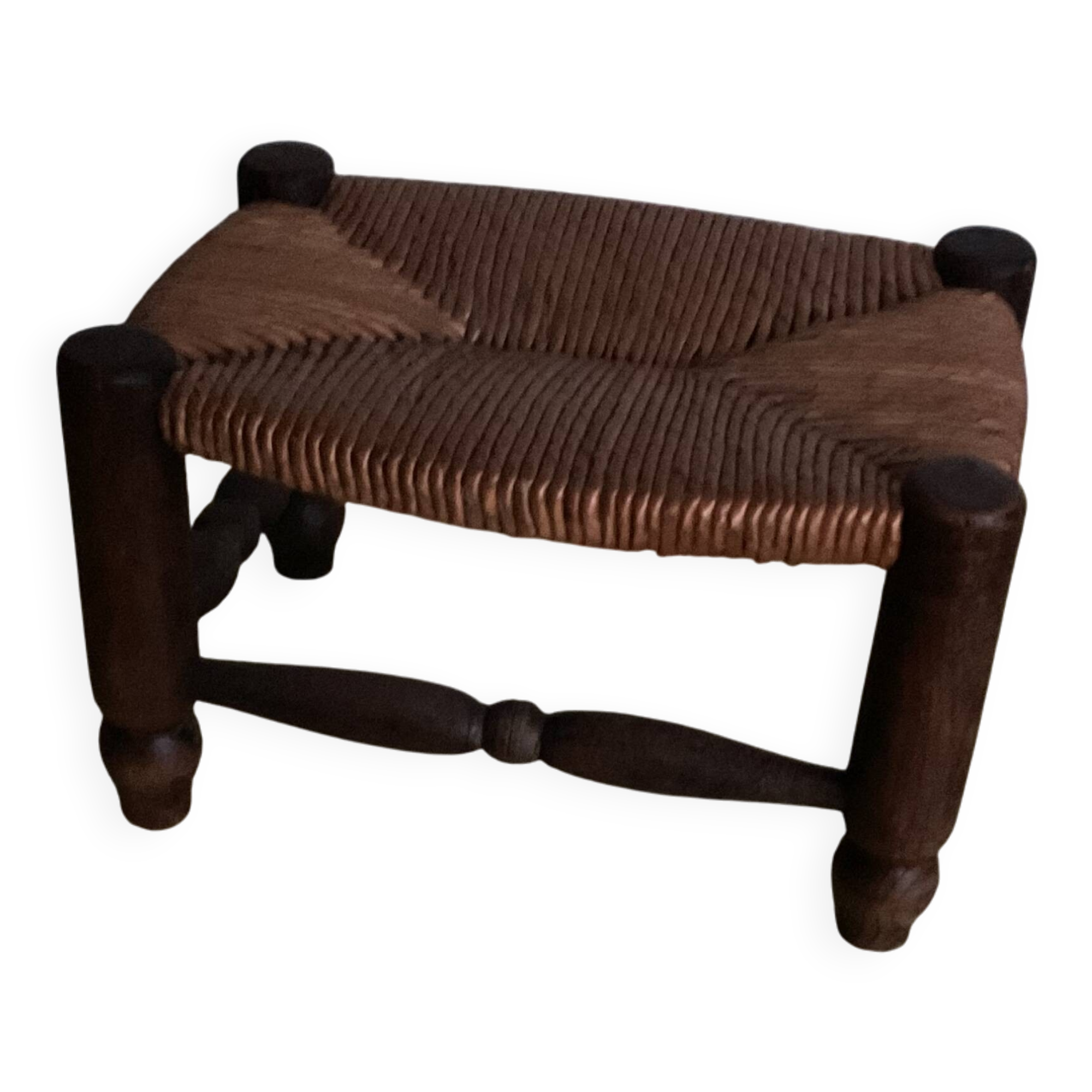 Turned wooden stool and straw