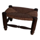 Turned wooden stool and straw