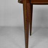 Art Deco mahogany round table by Jacques Adnet around 1940
