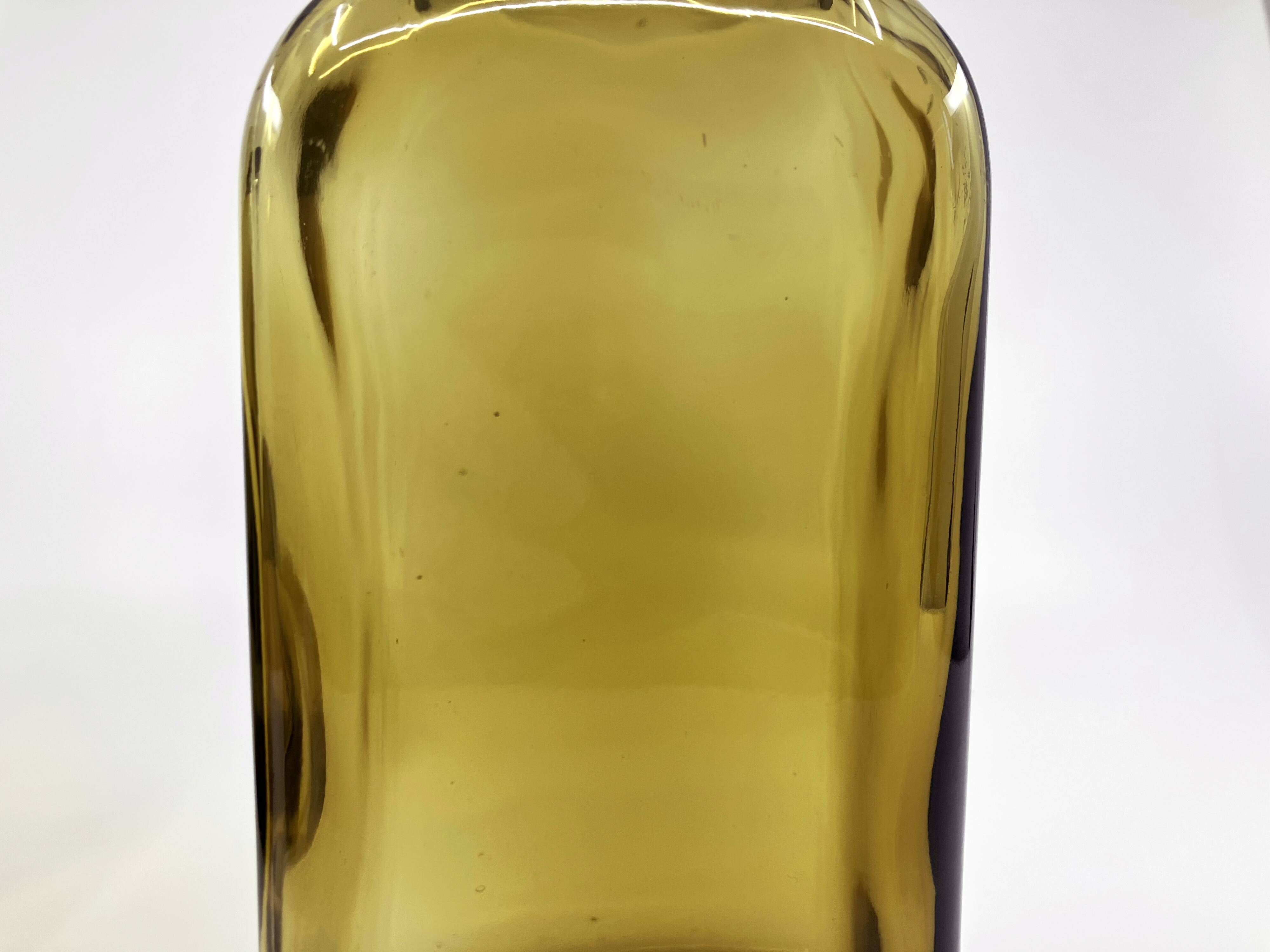 3 molded amber glass pharmacy bottles • Bakelite stoppers • 1950