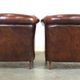 Set of two rugged sheep let of two rugged sheep leather club armchairs with a nice distressed look