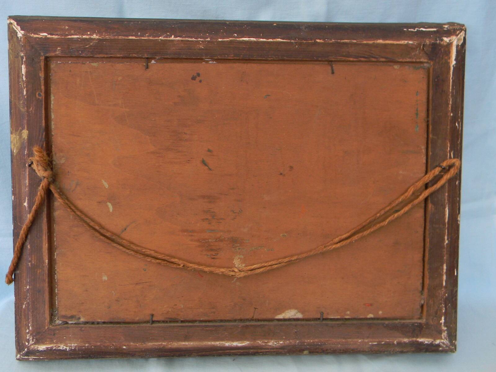 Old signed landscape painting under wood.