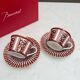 Pair of Baccarat Porcelain Coffee Cups and Saucers, Red Geometric Design