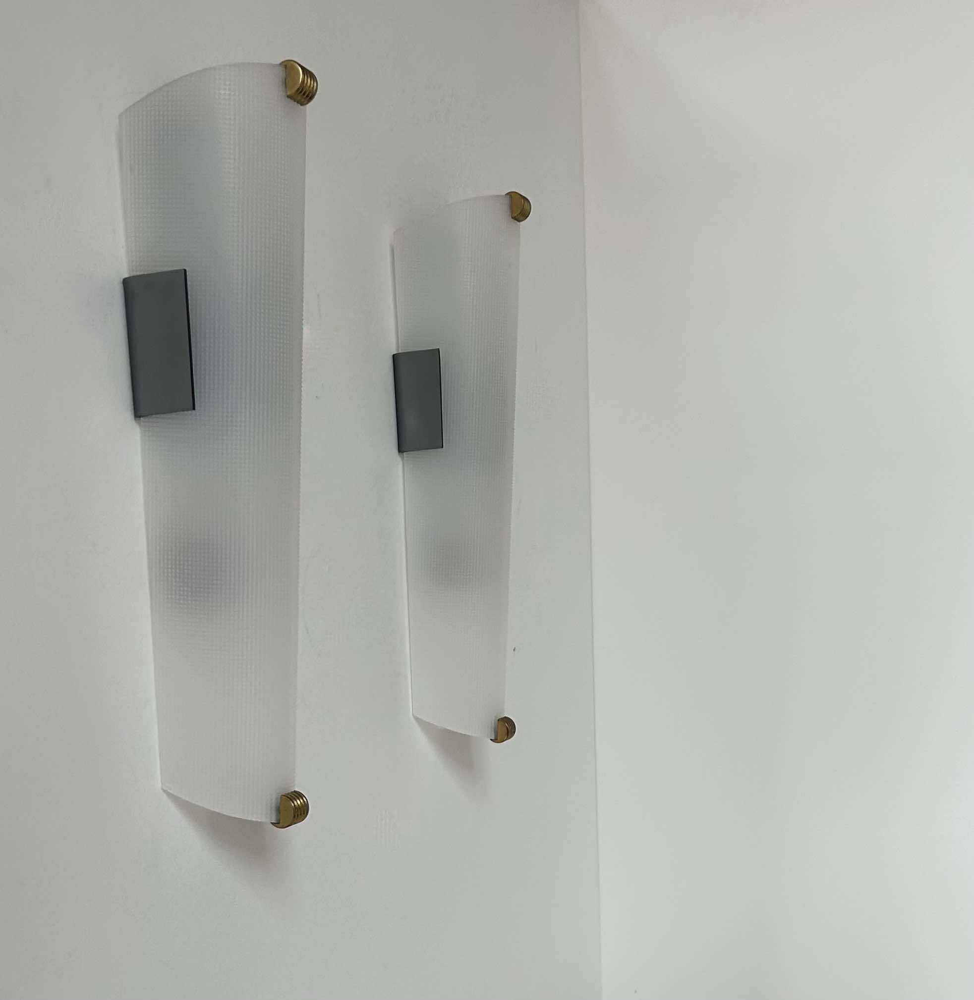 Pair of vintage brass and perspex wall lights, France 1960