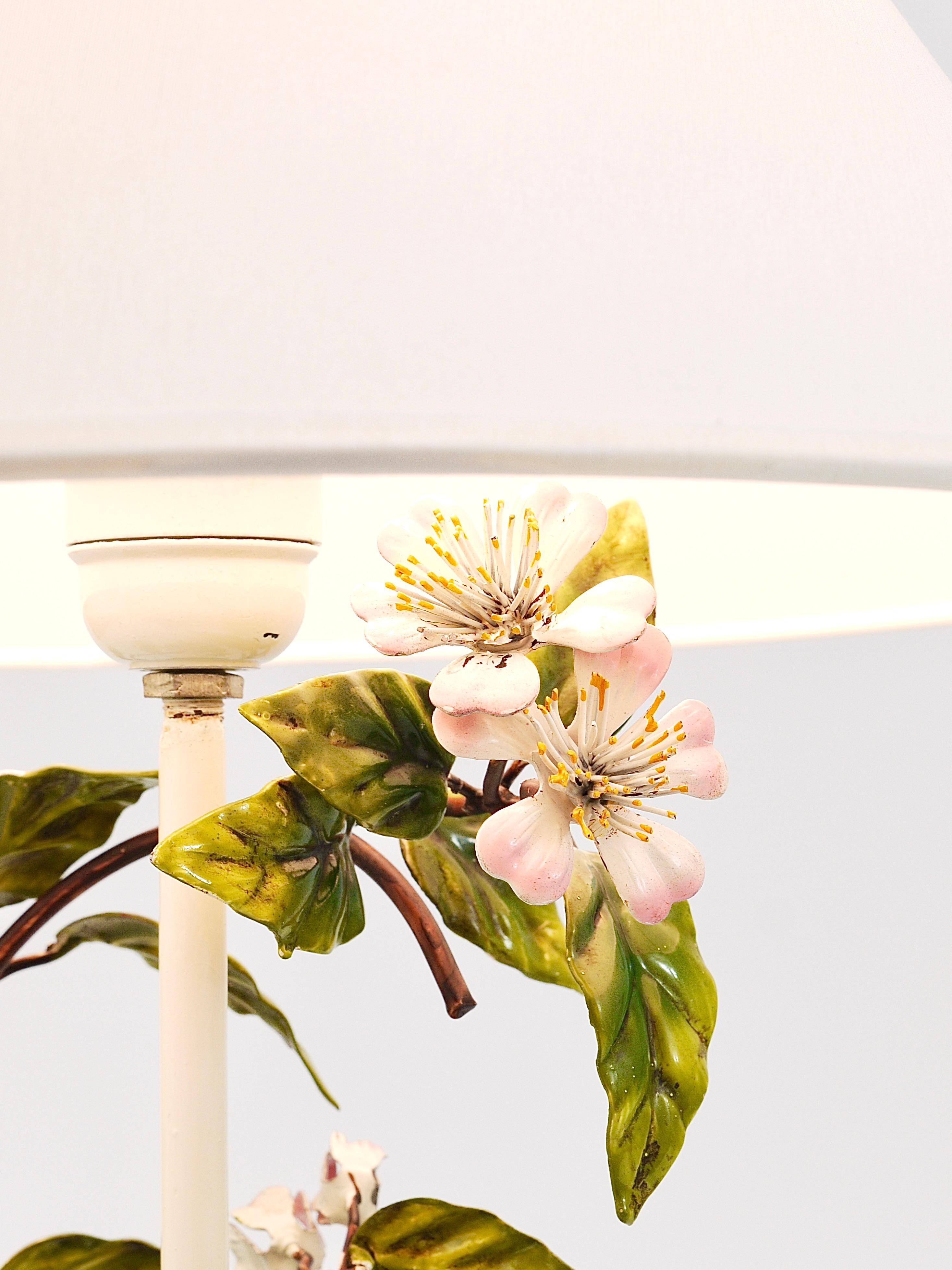 Hand-painted Toleware table lamp with wild apple blossom flowers, Salvadori, Italy, 1950s.