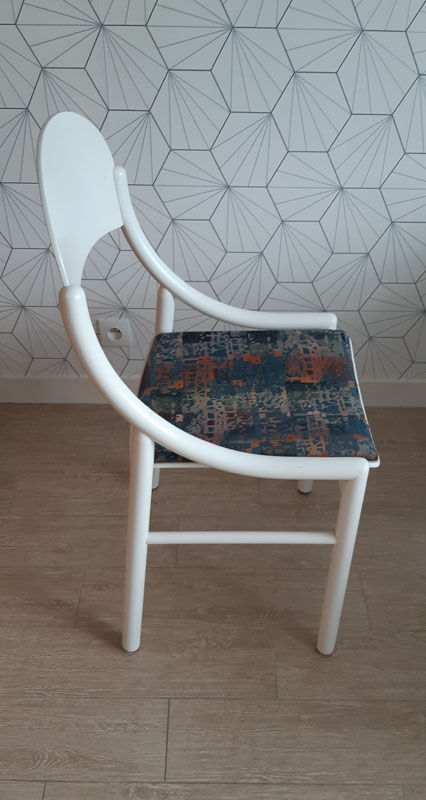 White Baumann chair.