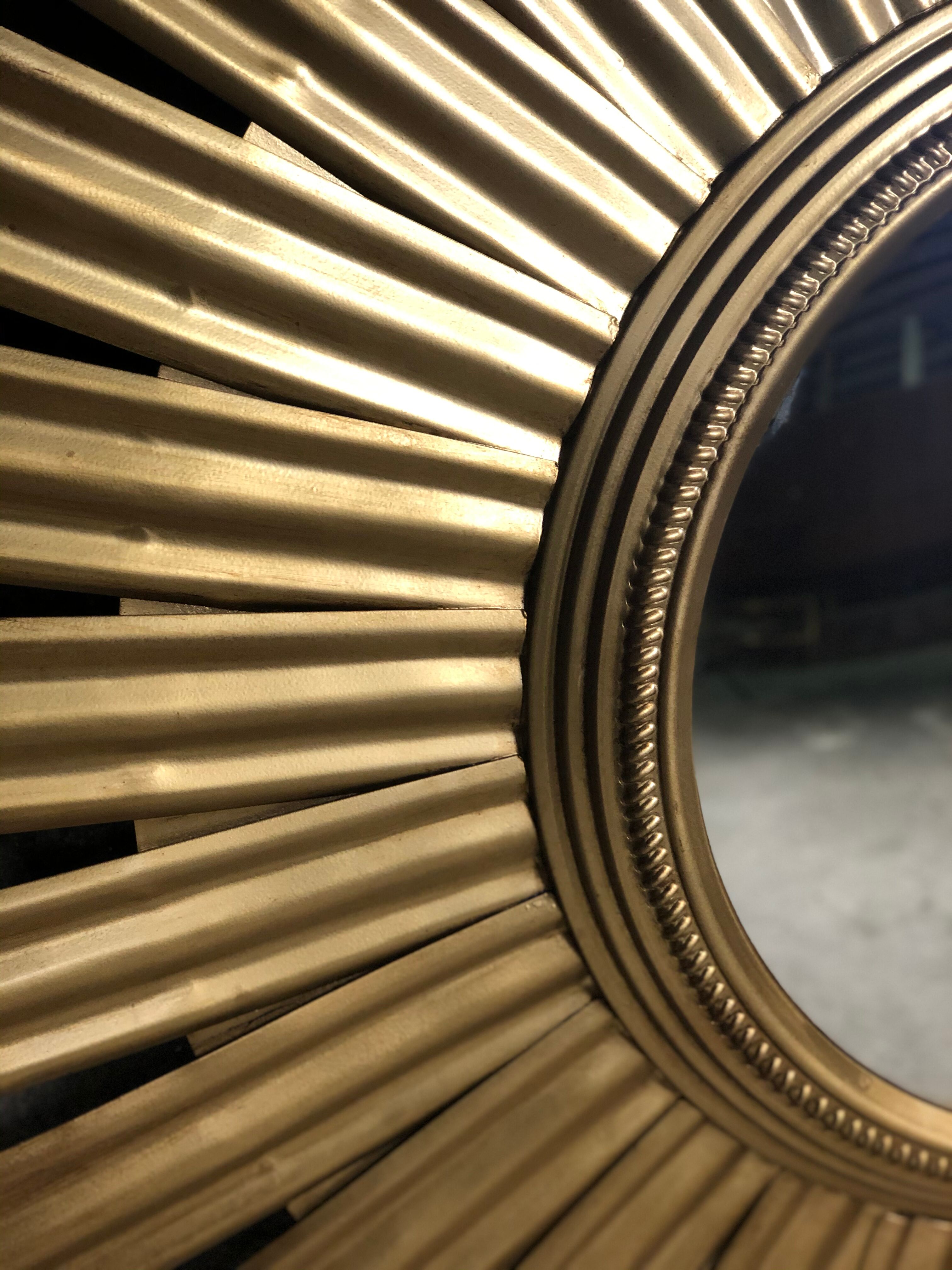 Sun mirror "André" in gilded sheet metal witch eye